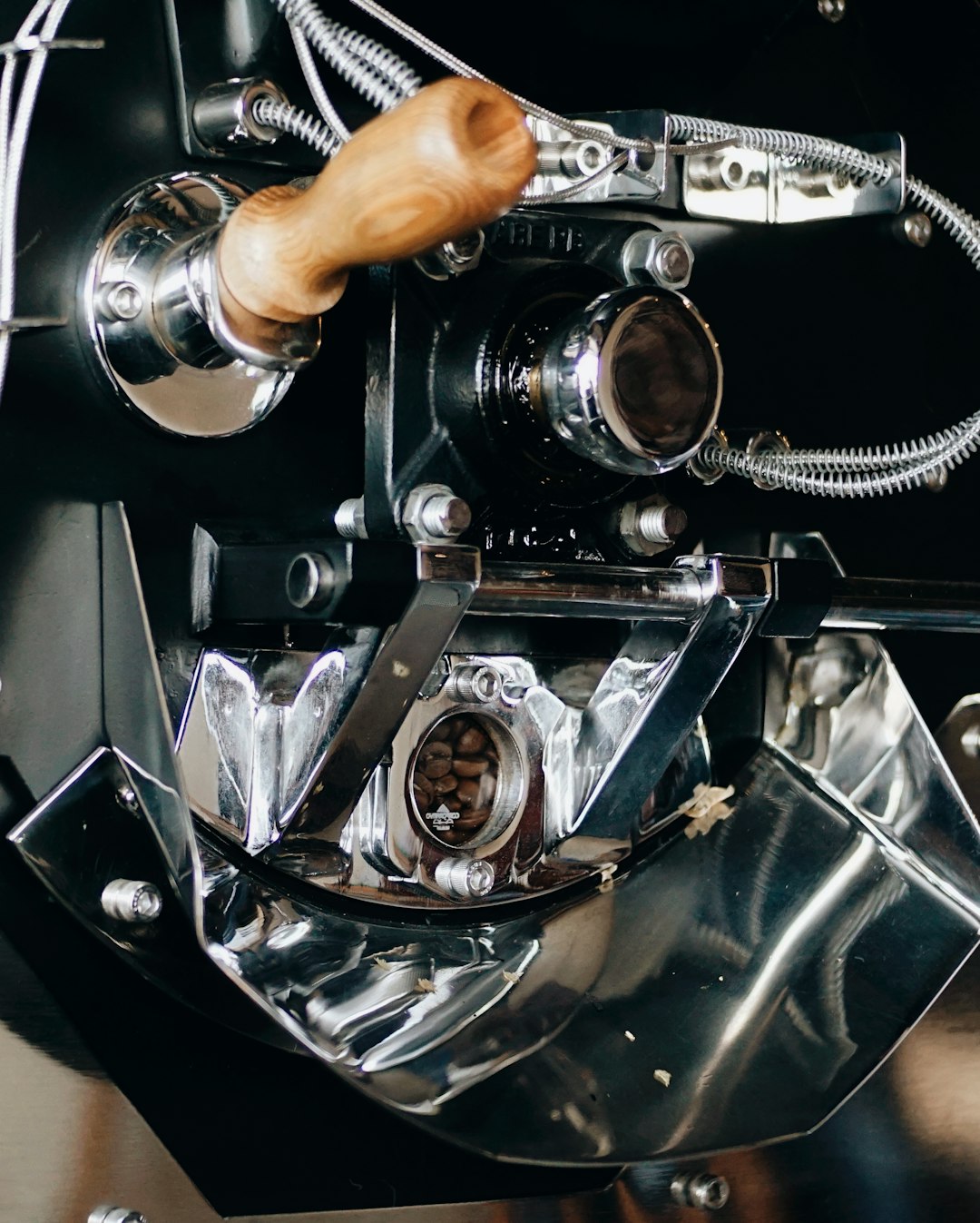 person holding black and silver car engine