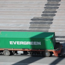 green and red freight truck