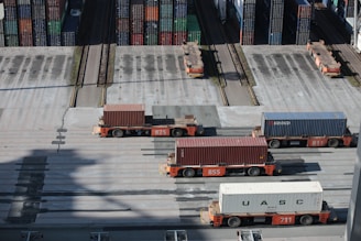 white and red truck on road during daytime