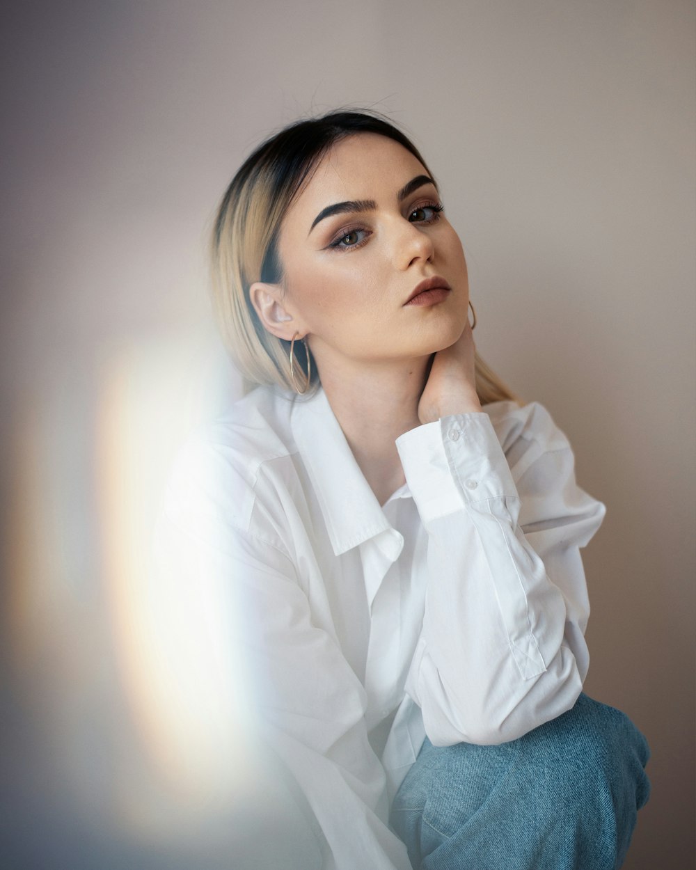 woman in white long sleeve shirt