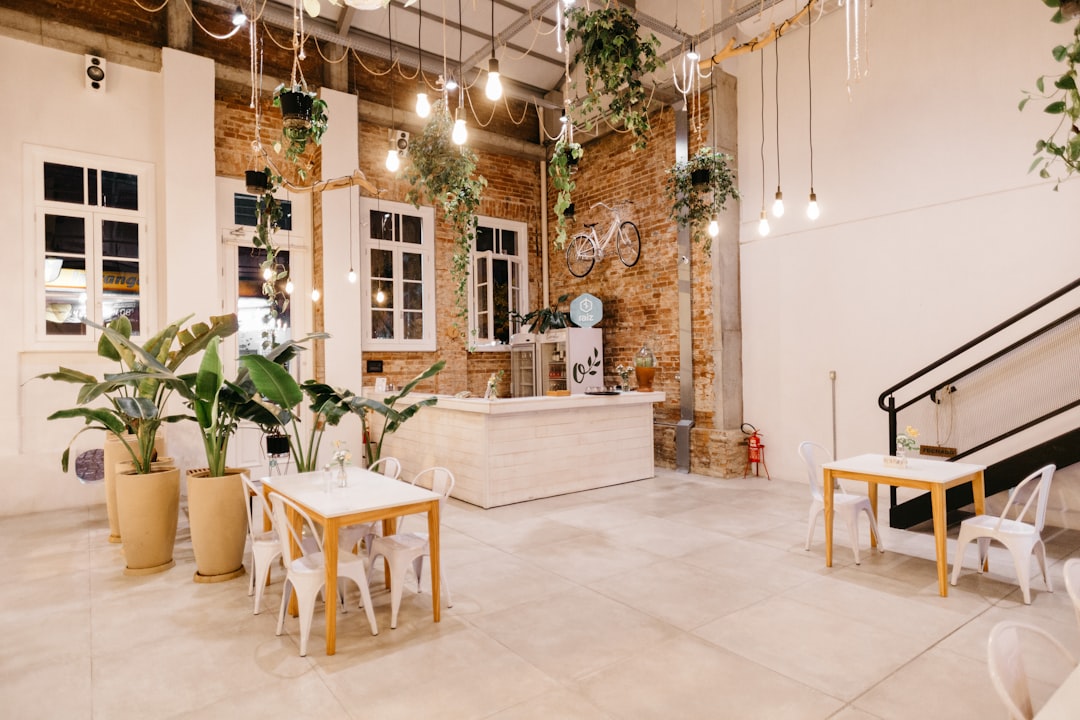 white wooden table with chairs