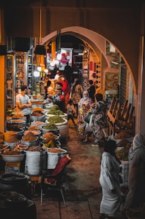 people in market during night time