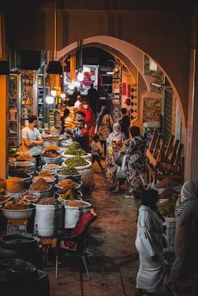 people in market during night time