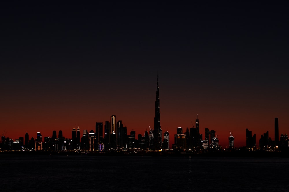 city skyline during night time