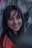 woman in red shirt smiling