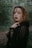 A mysterious sorceress casting spells in a dark forest.