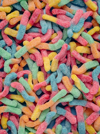pink yellow and blue candies