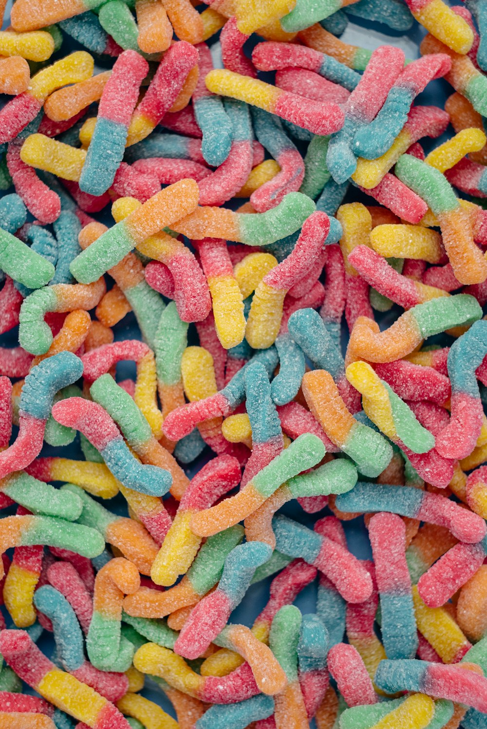 pink yellow and blue candies