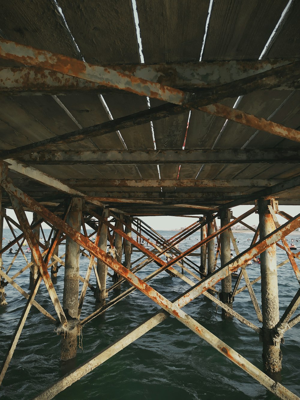 brown wooden dock over body of water during daytime