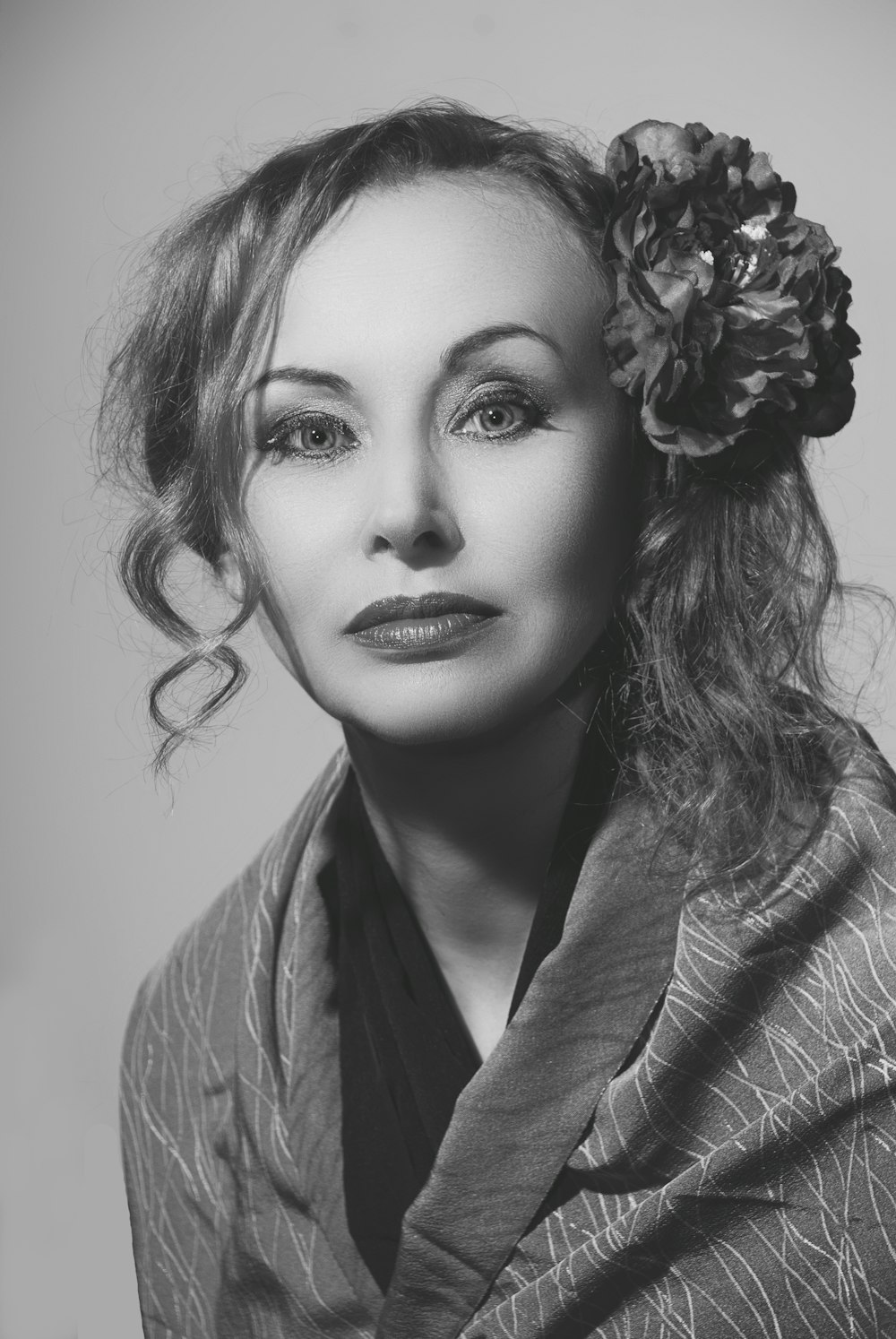 woman in gray scarf and white shirt