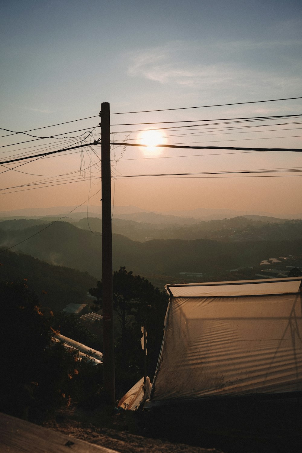 white tent on top of mountain during daytime