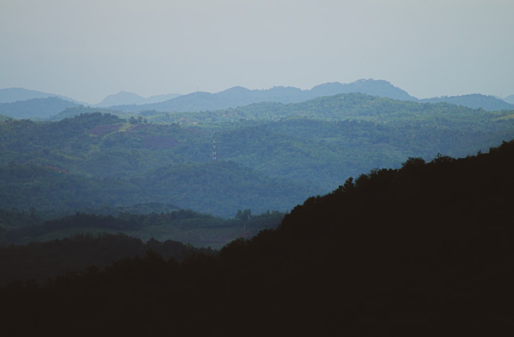 green mountains under white sky during daytime