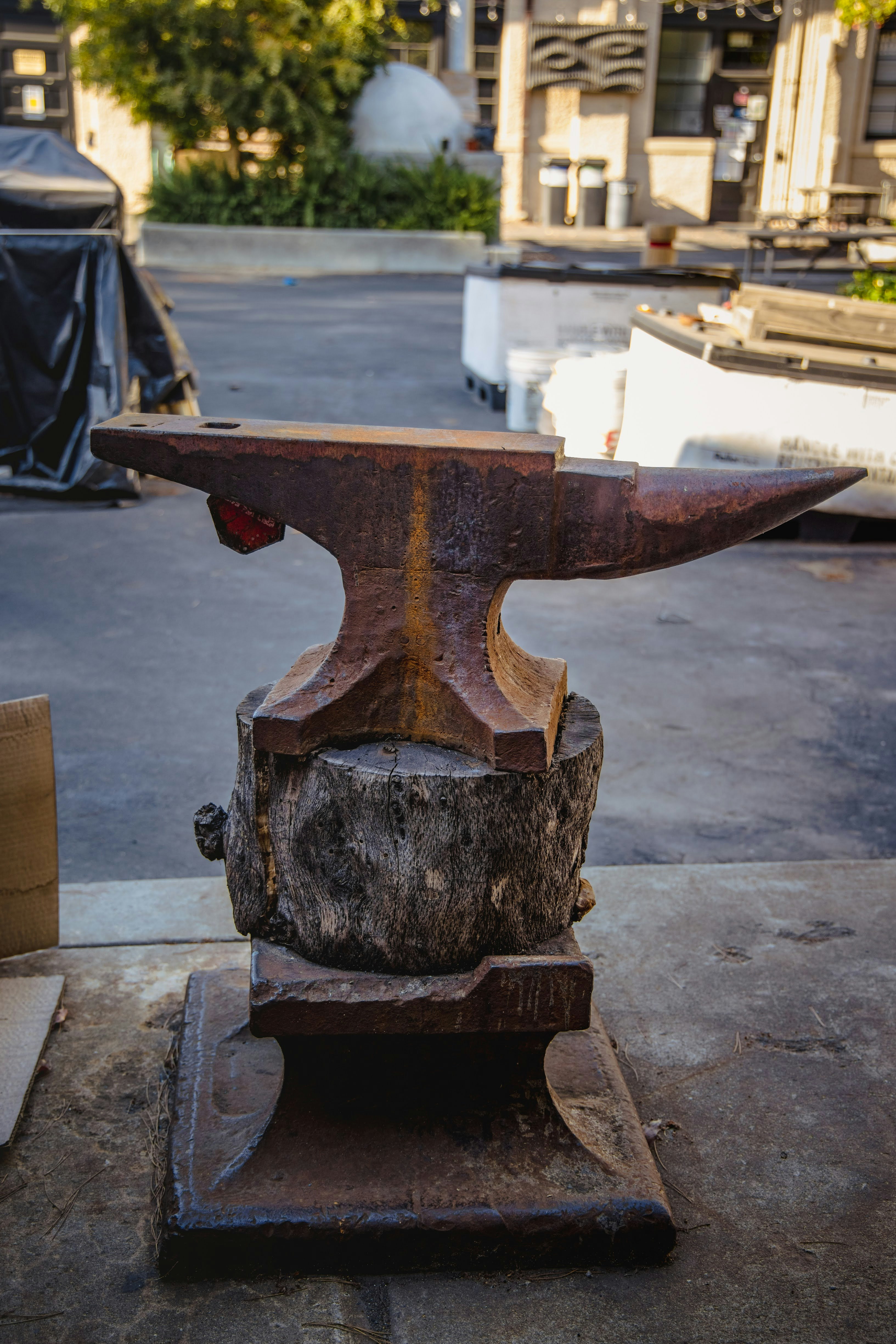 brown wooden table on gray concrete floor