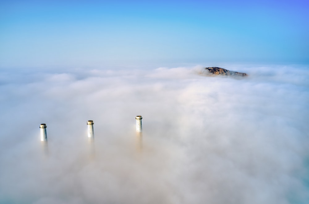 white clouds over white tower