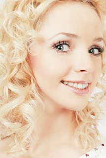 blonde woman with pink lipstick