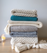 white and blue knit textile