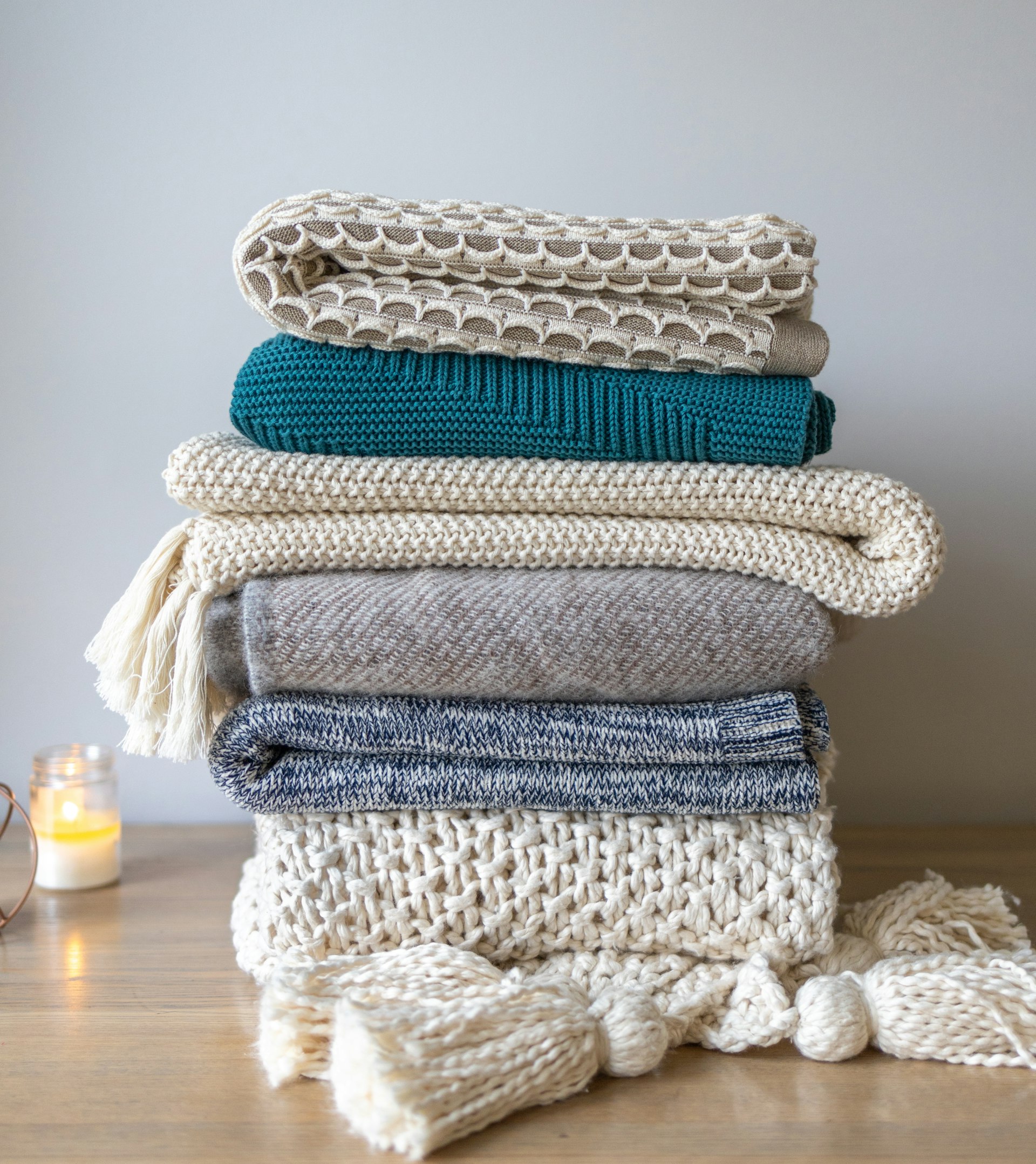 Stacked white hotel bath towels in long-staple Turkish cotton