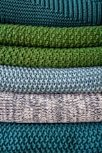 green and white striped textile