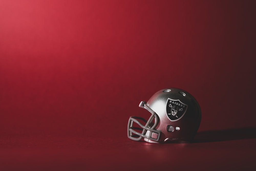 red and white football helmet