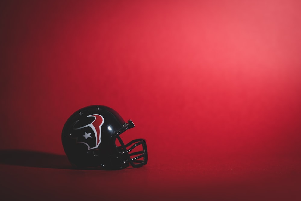 black and red football helmet