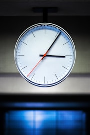 white analog watch at 10