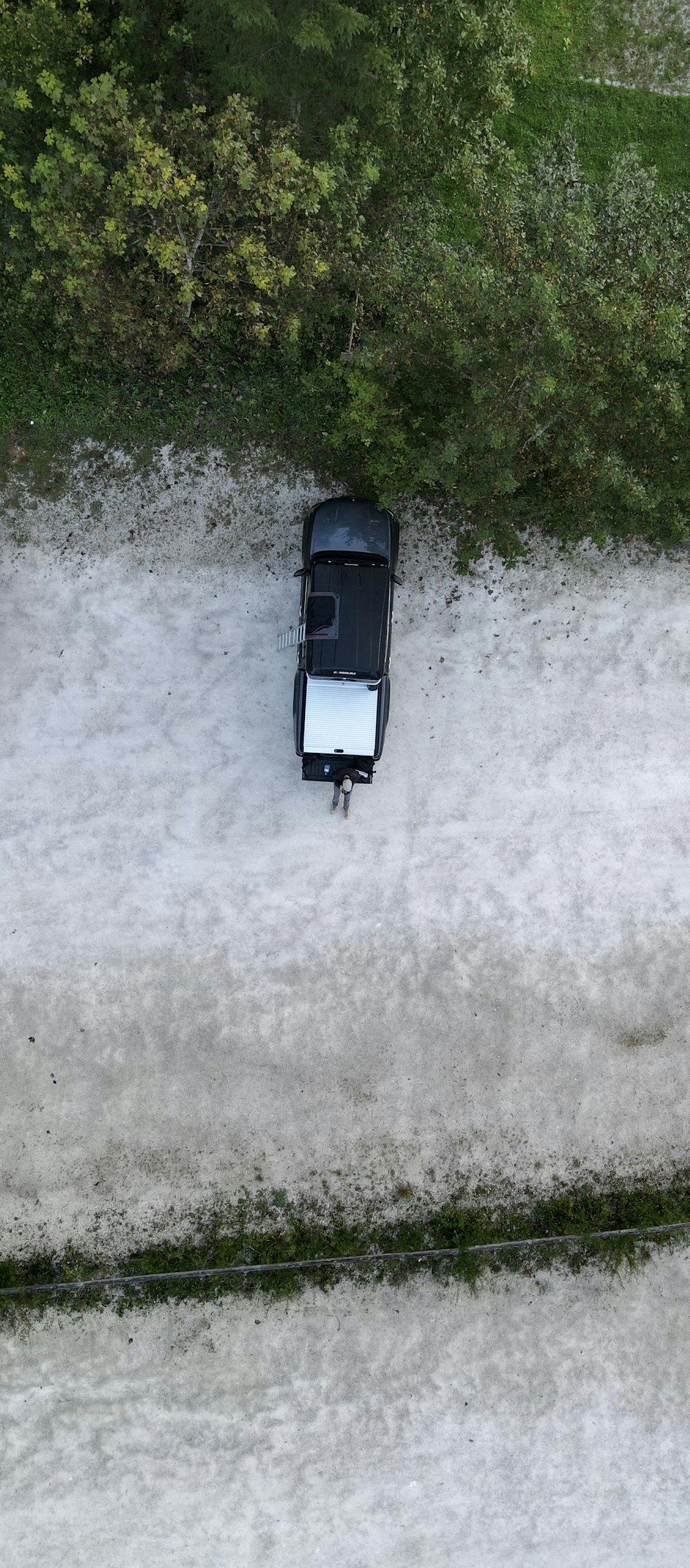 black car on gray road