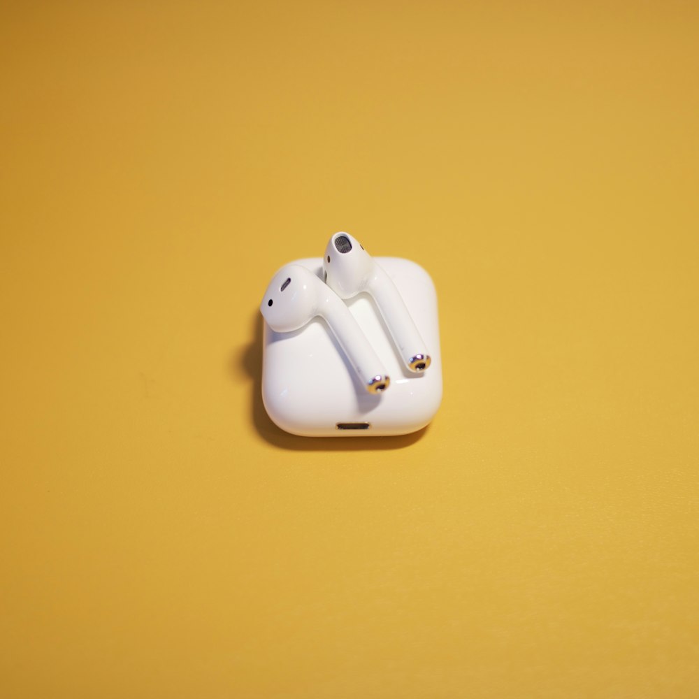 white apple airpods charging case