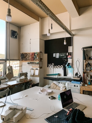 Fabric samples and pattern pieces on a work table