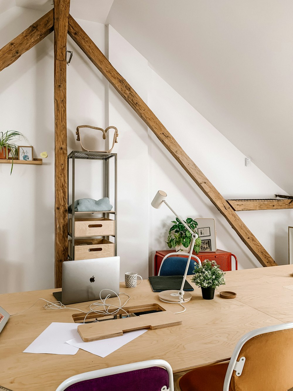 silver imac on brown wooden desk