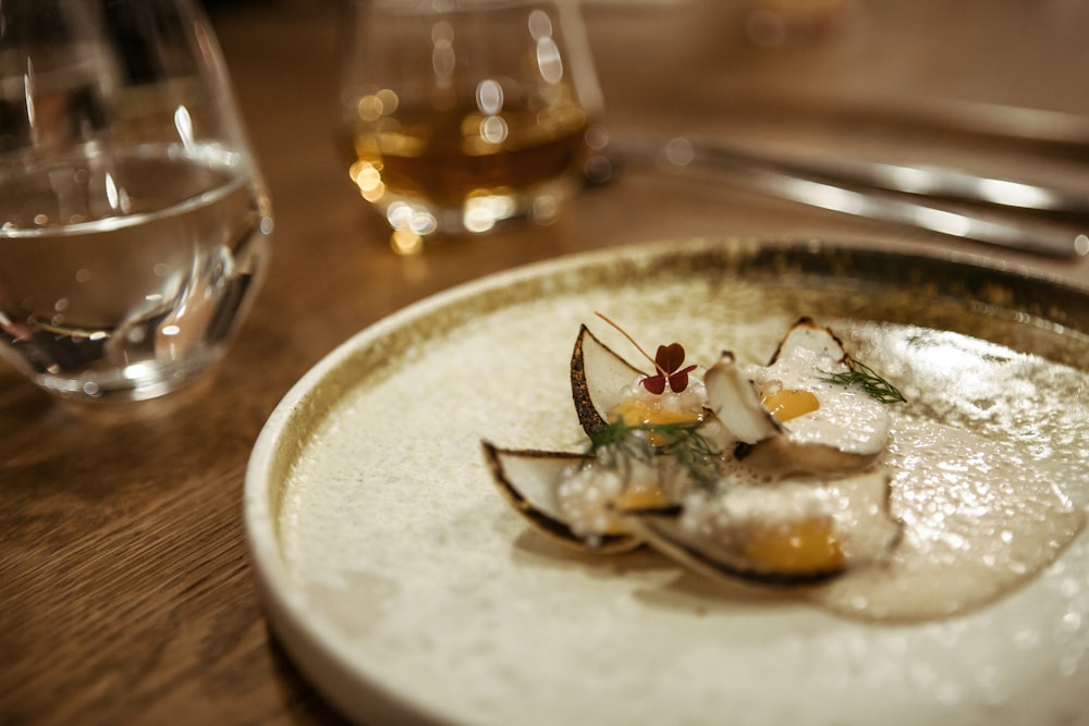 white ceramic plate with green vegetable dish