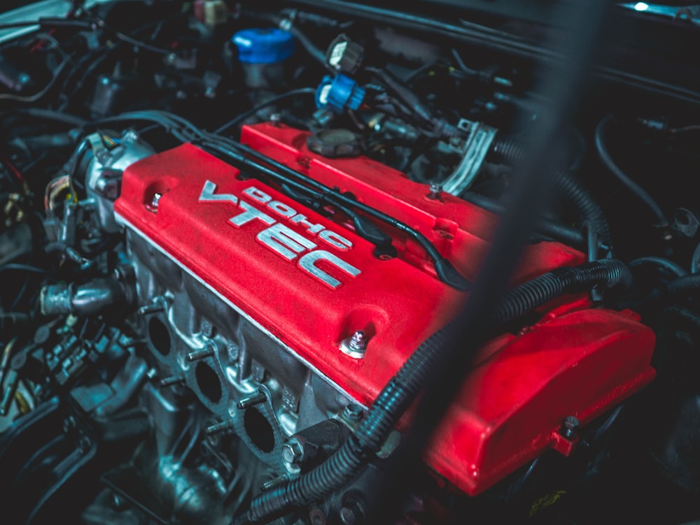 Red and black car engine photo – Free Motor Image on Unsplash