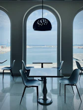 black wooden table and chairs