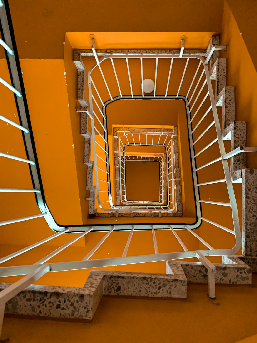blue and yellow metal staircase