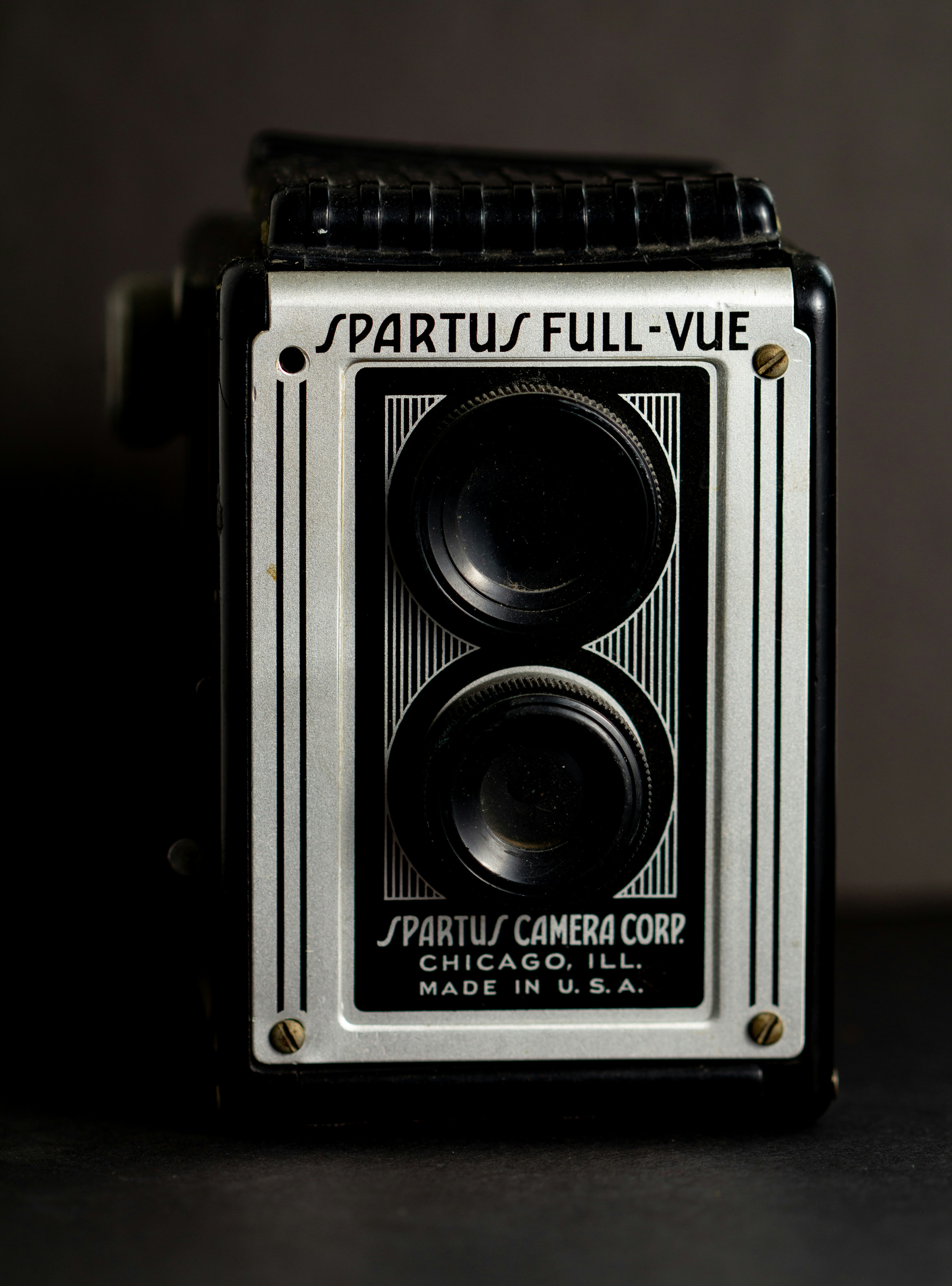 black and silver camera in grayscale photography