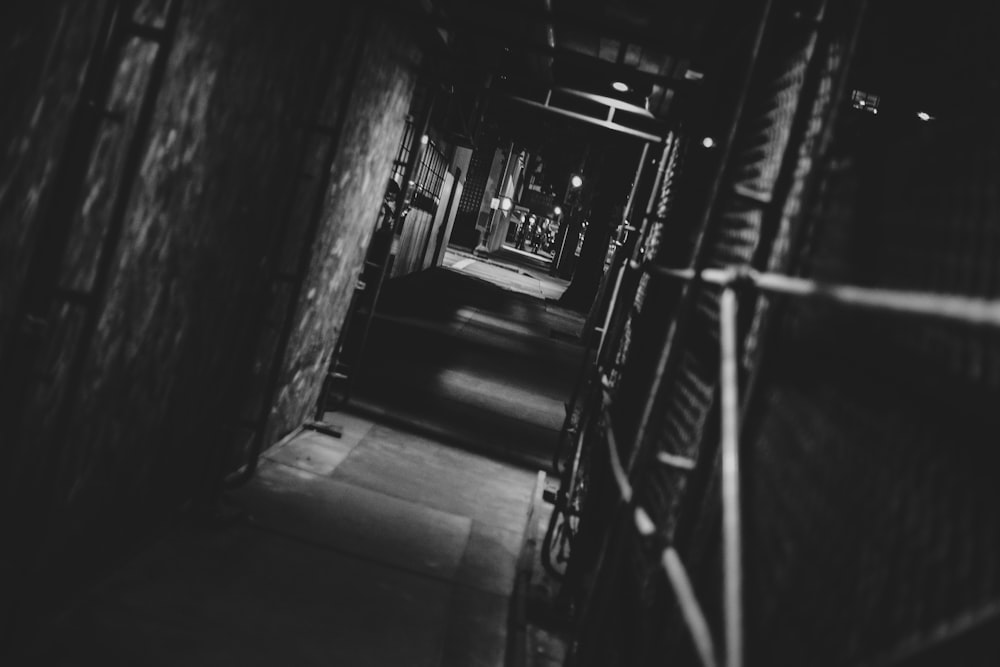 grayscale photo of a hallway