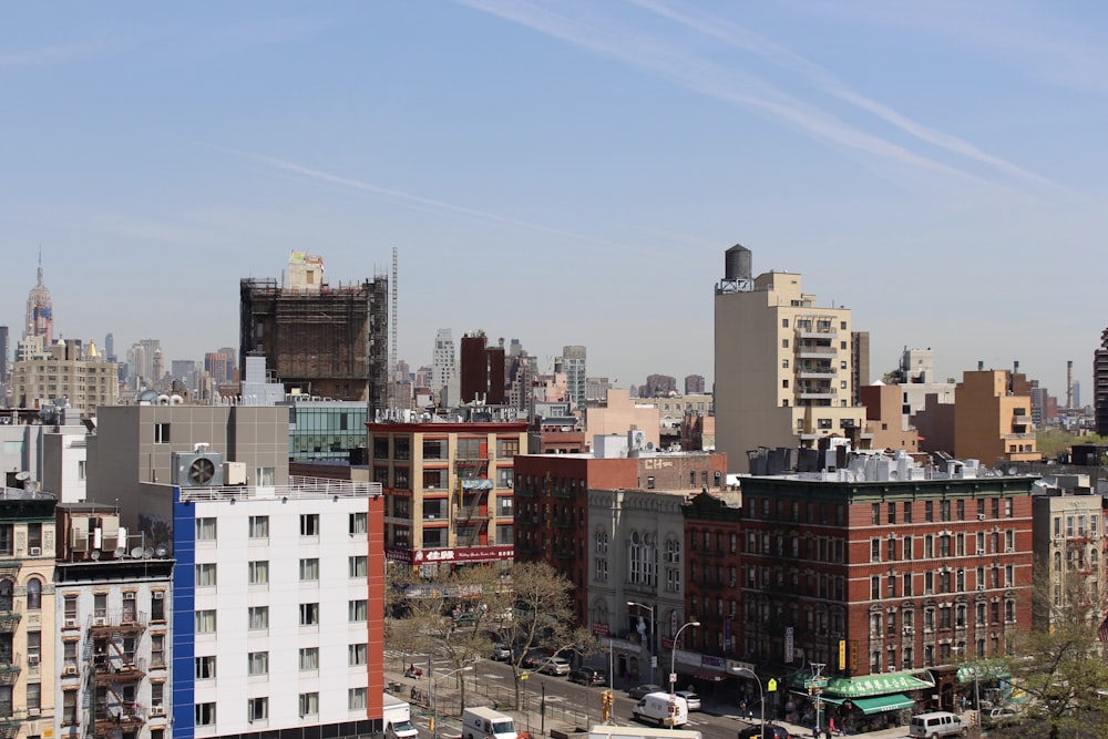 brown and white concrete building under blue sky during daytime