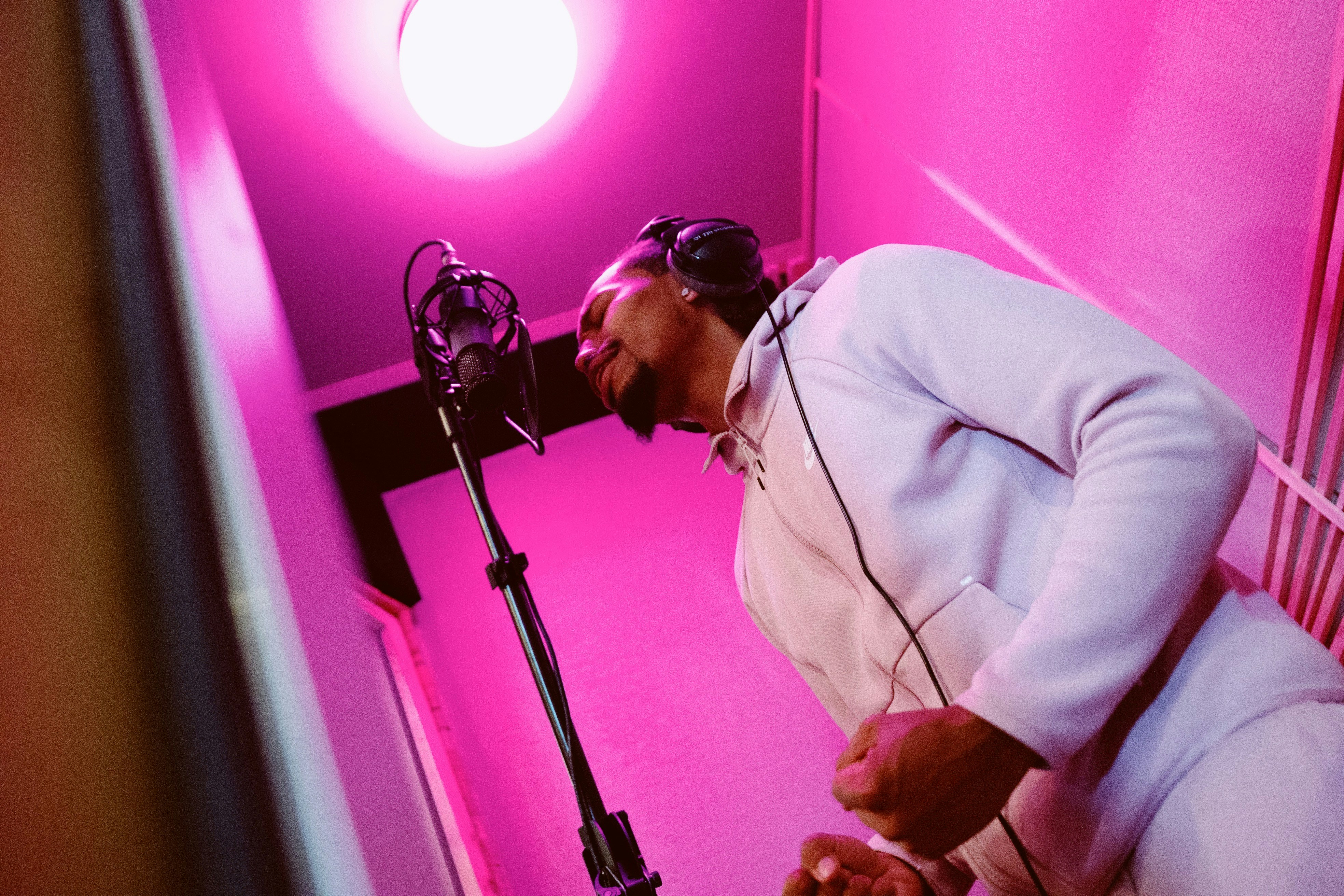 man in white dress shirt wearing black sunglasses