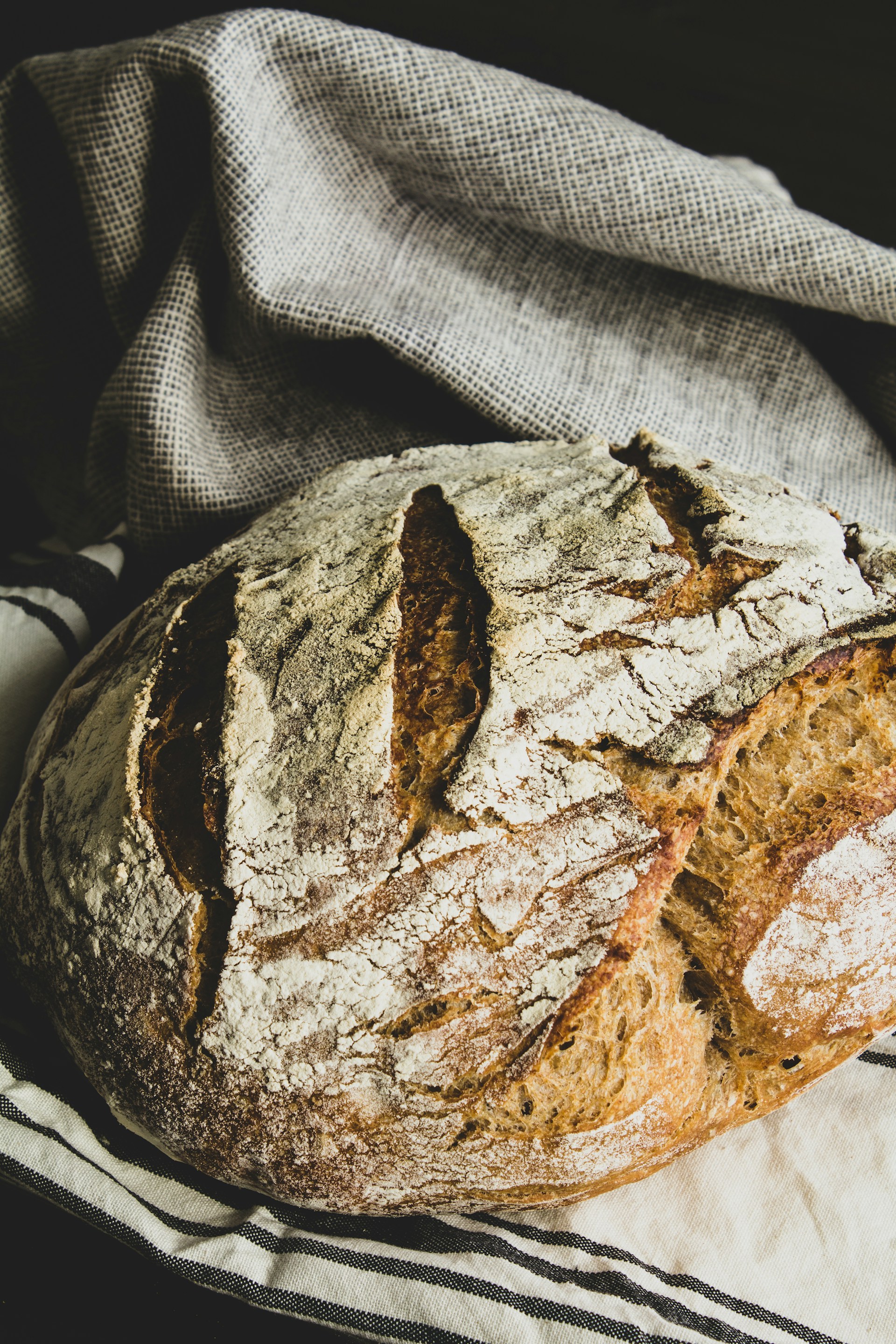 brown bread on white and black textile
