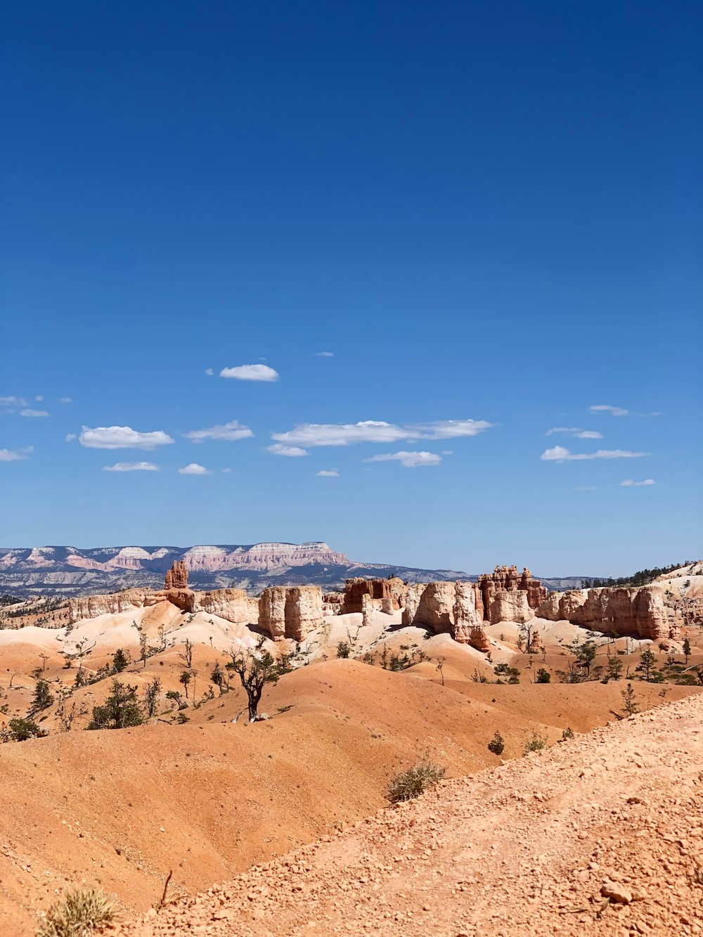 brown rock formation under blue sky during daytime