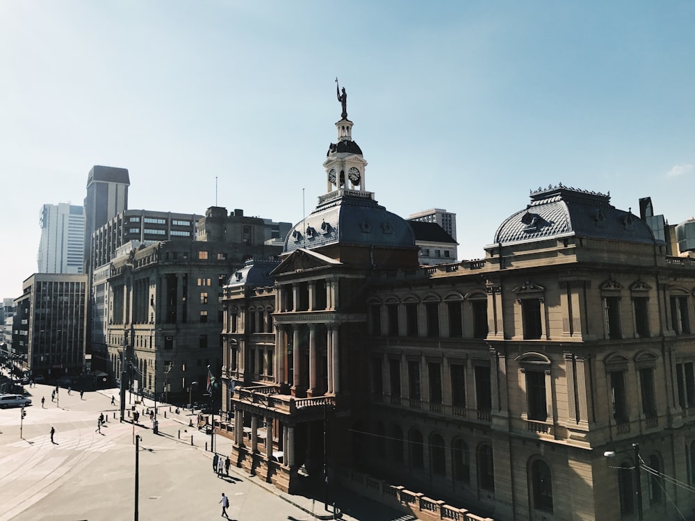 people walking on street near building during daytime