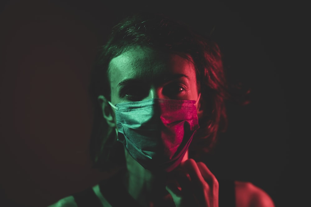 woman with green and red face paint