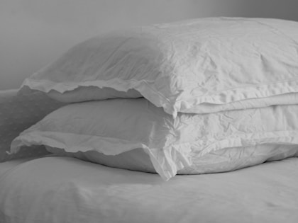 White bed pillow on bed