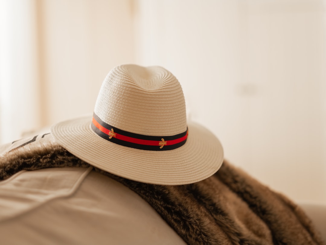 white and black fedora hat