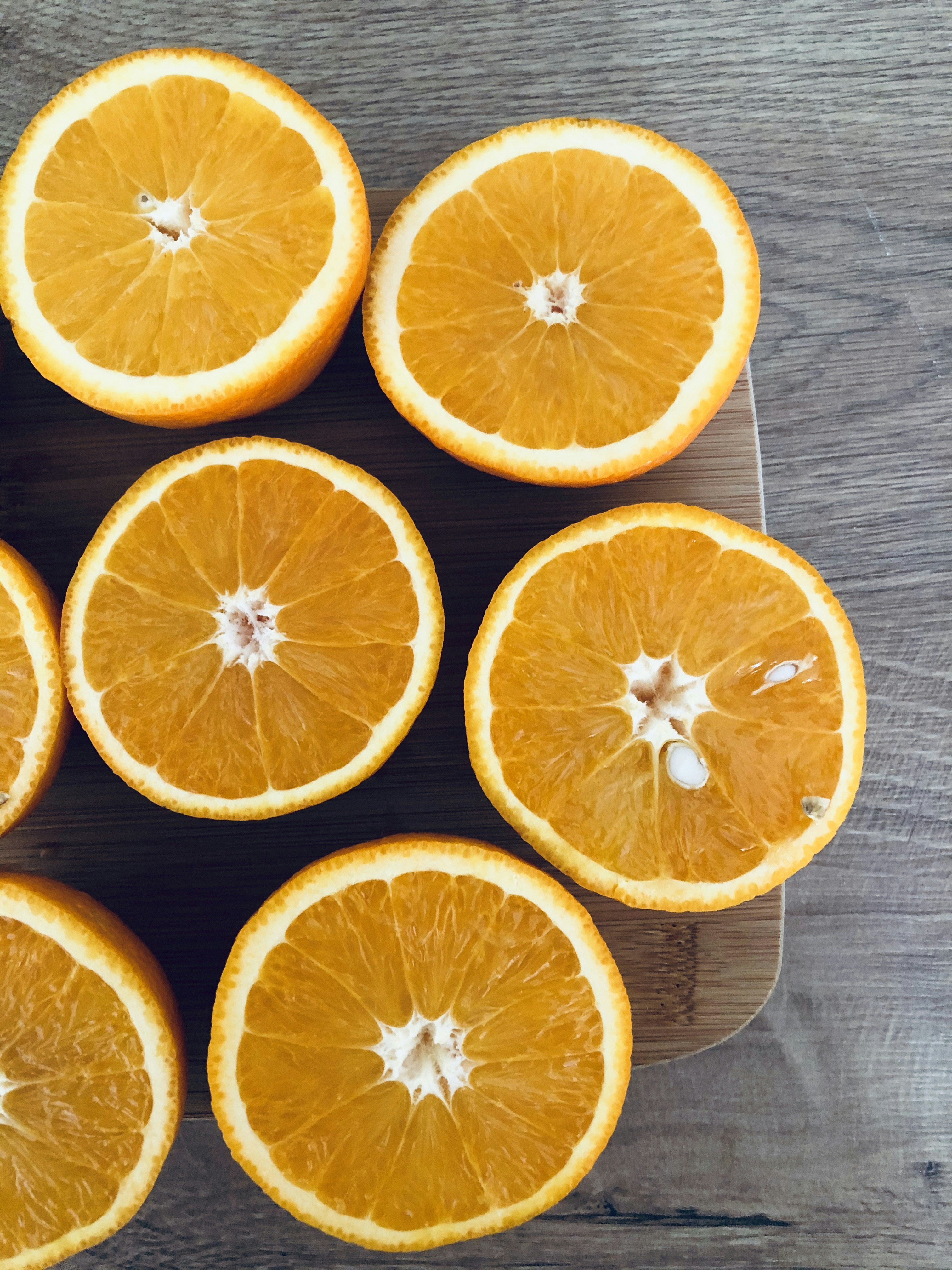 Fresh Egyptian navel oranges in wooden export crate — bright uniform orange colour, export quality