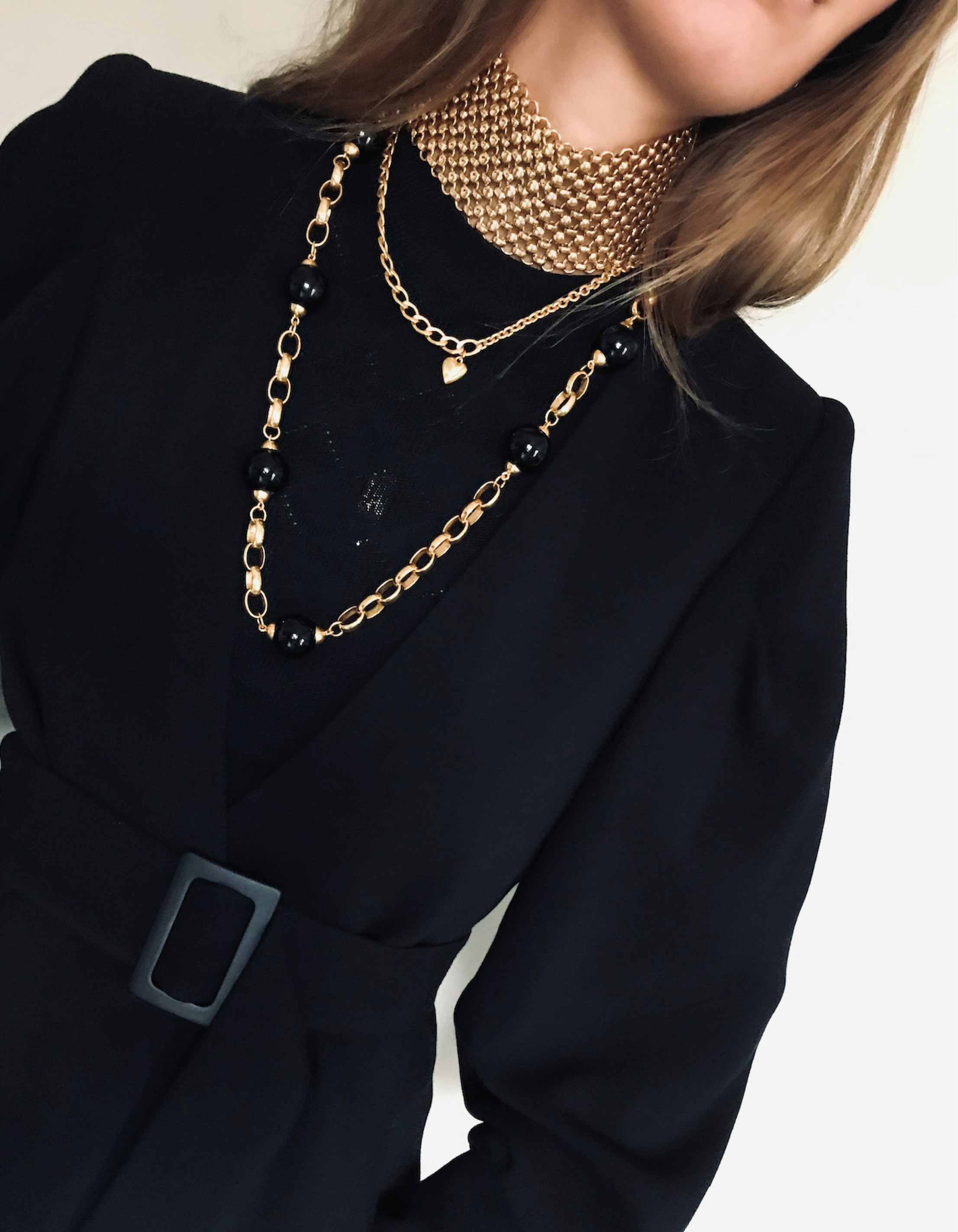 Stunning gold plated jewelry elevating woman's outfit