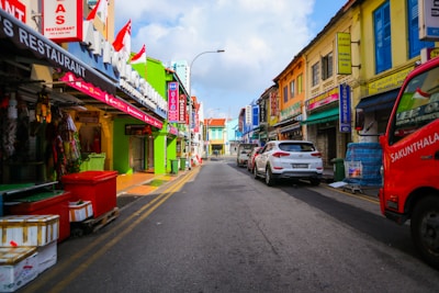 Colorful storefronts in Tulkarem bustling with activity and student engagement