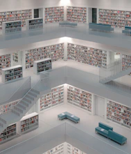 A modern, minimalist library of digital educational materials in black and gold.