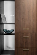brown wooden cabinet beside white printer