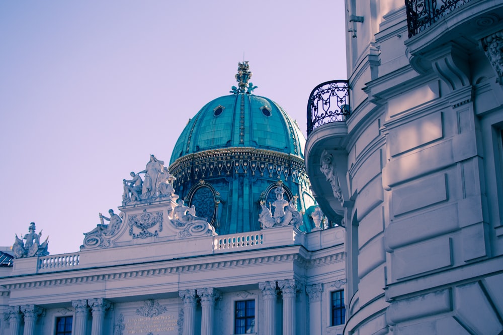 a building with a blue dome on top of it