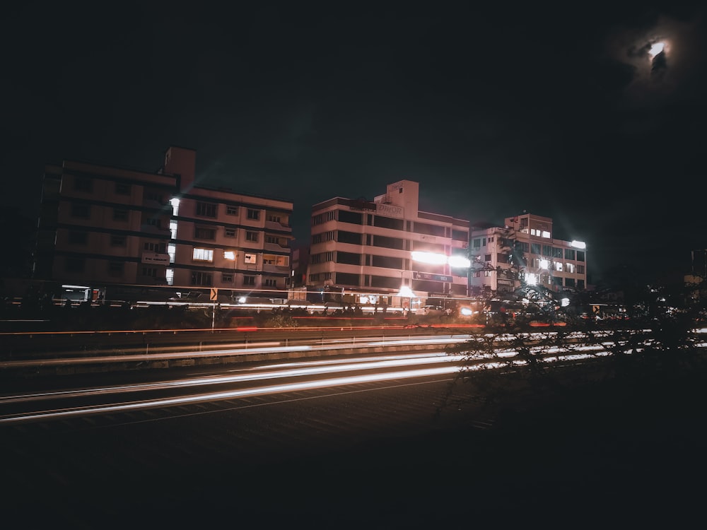 time lapse photography of city buildings during night time
